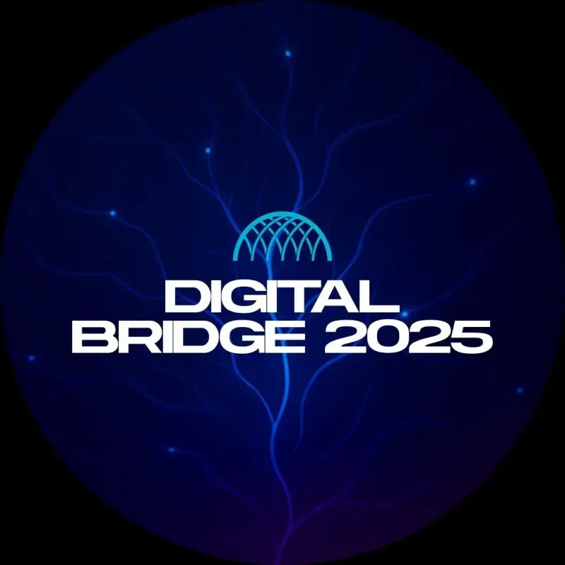 A circular logo on a dark blue background with glowing light blue lines and dots, featuring a light blue dome icon above the white text "DIGITAL BRIDGE 2025".
