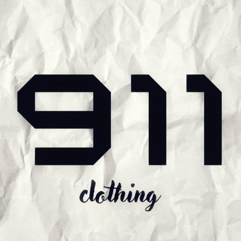 The image features the number "911" in a bold, black, geometric font, with the word "clothing" written in a cursive font below it, all set against a crumpled white background.