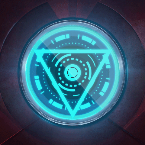 The image features a circular, transparent interface with a glowing blue triangular design at its center, surrounded by smaller circular and linear elements, all set against a dark, metallic background with reddish hues.