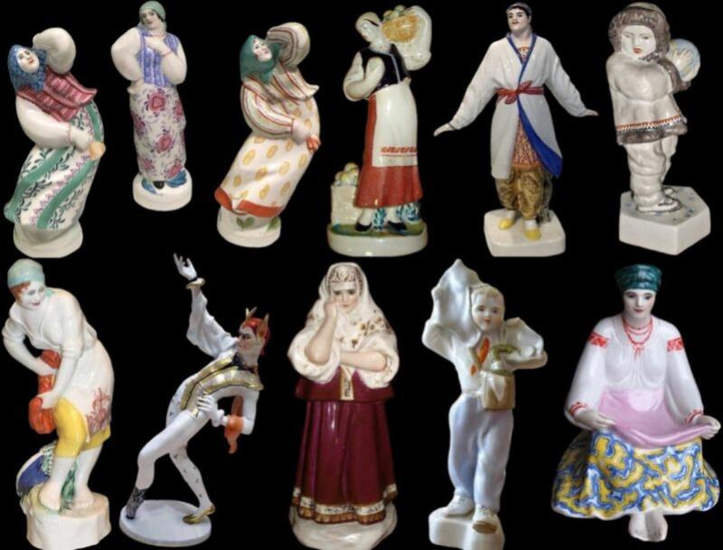 The image shows a collection of twelve porcelain figurines depicting people in traditional clothing, arranged against a black background.