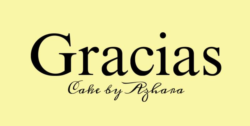 Black text "Gracias" in a large serif font, with "Cake by Azhara" in a smaller script font below it, all set against a pale yellow background.