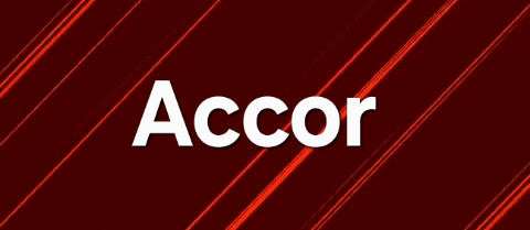 The image shows the word "Accor" in white against a red background with diagonal red lines.