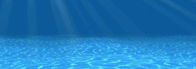 The image shows an underwater scene with sunlight filtering through the surface, creating patterns on the ocean floor.