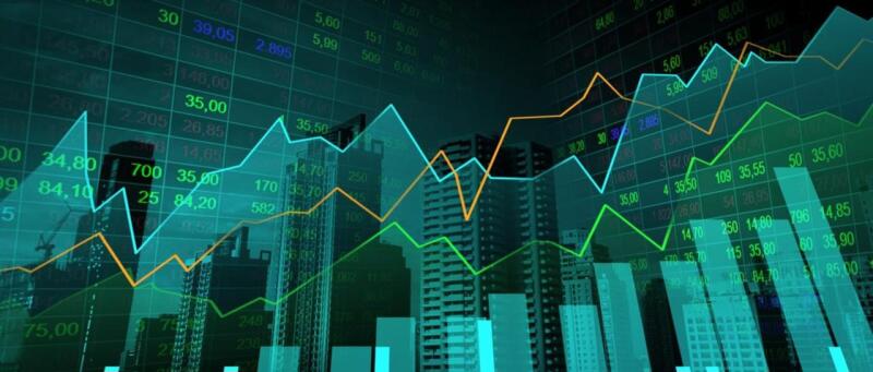 The image contains financial graphs with blue, green, and yellow lines overlaid on a city skyline and stock market data.