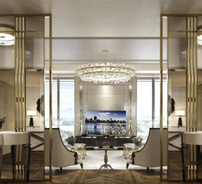 The interior features chairs, a chandelier, and a TV showing a cityscape, all in a luxurious and elegant setting.