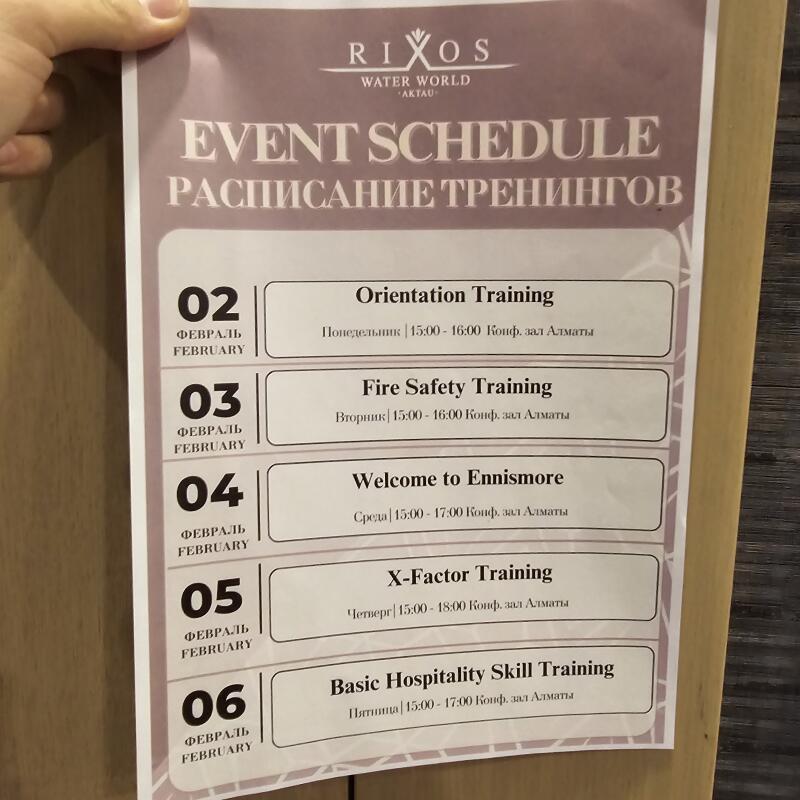 The image is a schedule of events for Rixos Water World Aktau, listing training sessions from February 2nd to February 6th, including Orientation Training, Fire Safety Training, Welcome to Ennismore, X-Factor Training, and Basic Hospitality Skill Training.
