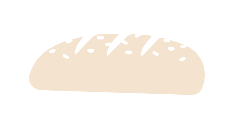A loaf of bread with cuts on top and sprinkled with black seeds.