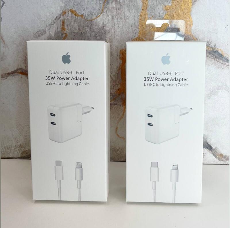 Две коробки Apple "Dual USB-C Port 35W Power Adapter USB-C to Lightning Cable" расположены рядом.