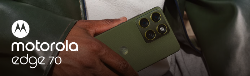 A person is holding a green Motorola Edge 70 smartphone, which features a quad-camera setup on the back.
