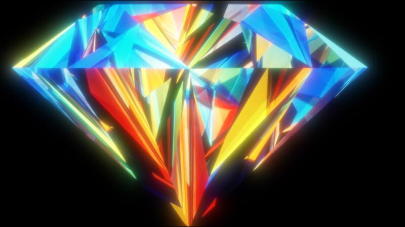 A colorful, faceted diamond shape is set against a black background, with hues of blue, yellow, and red creating a vibrant display of light and color.