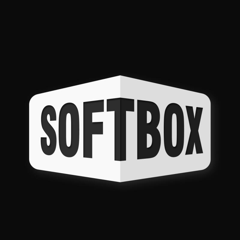 The image shows a white, three-dimensional box with the word "SOFTBOX" written in black, block letters across the front.