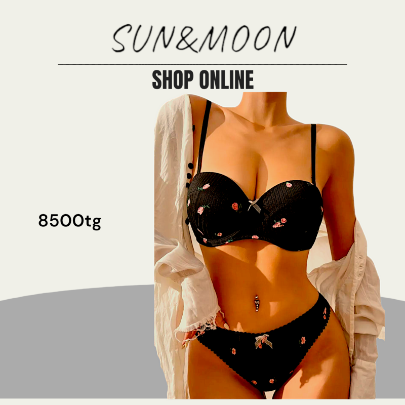 A woman is modeling a black lingerie set with strawberry patterns, complemented by a white unbuttoned shirt, under the brand "SUN&MOON" with "SHOP ONLINE" text; the price is listed as 8500tg.