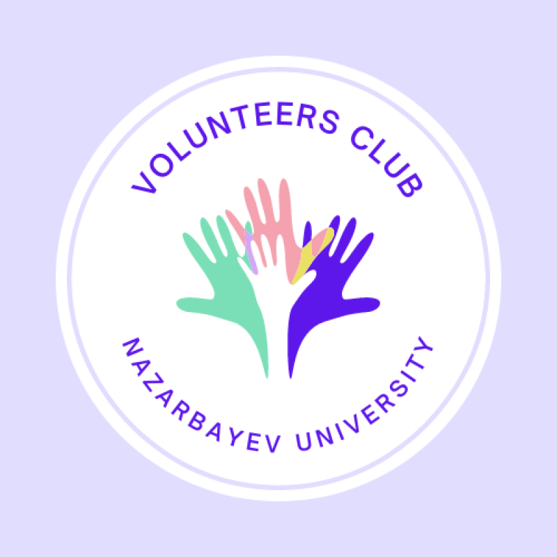 The logo is a white circle with a light purple background, featuring the text "VOLUNTEERS CLUB" at the top and "NAZARBAYEV UNIVERSITY" at the bottom, surrounding an image of overlapping colored hands.