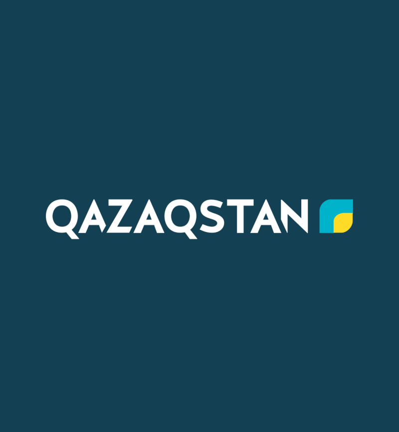 The image displays the word "QAZAQSTAN" in white text on a dark teal background, with a blue and yellow emblem to the right.