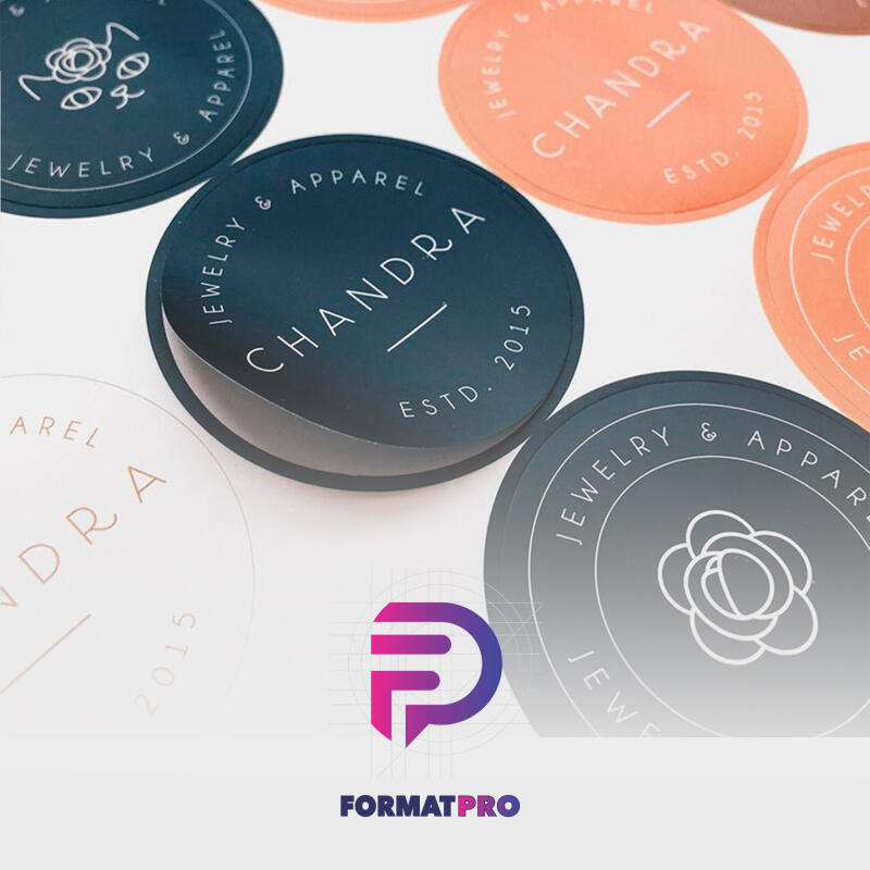 The image features an assortment of round stickers with the text "JEWELRY & APPAREL CHANDRA ESTD. 2015" circling the edge and an icon in the center of some. The FormatPro logo is at the bottom.
