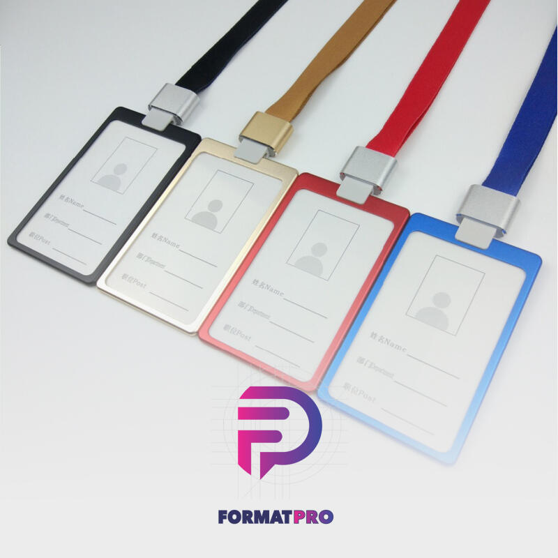 Four colorful ID card holders with lanyards are arranged diagonally, each with a space for a photo and lines for 'Name' and 'Post'. The colors of the card holders and lanyards are black, gold, red, and blue. A logo with the text 'FORMATPRO' is in the lower part of the frame.