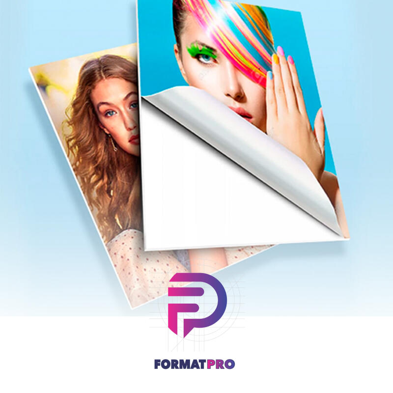Two glossy posters are displayed, one featuring a woman with blonde wavy hair and the other with a woman with colorful hair highlights against a blue background; the bottom right corner of the latter poster is peeling off, revealing a white backing. The 'FORMATPRO' logo is visible at the bottom.