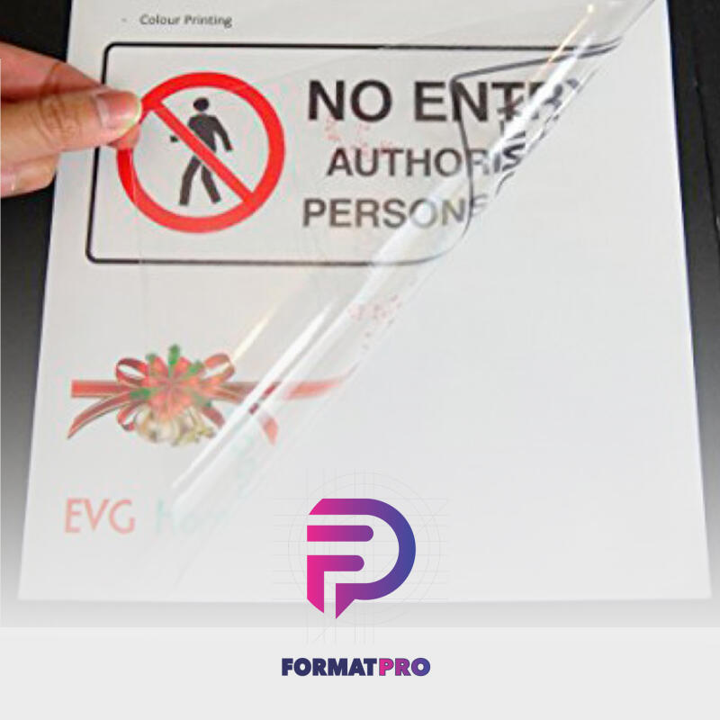 A sign that reads "NO ENTRY AUTHORISED PERSONS ONLY" with a symbol of a person inside a red circle with a line through it is being peeled from its backing.