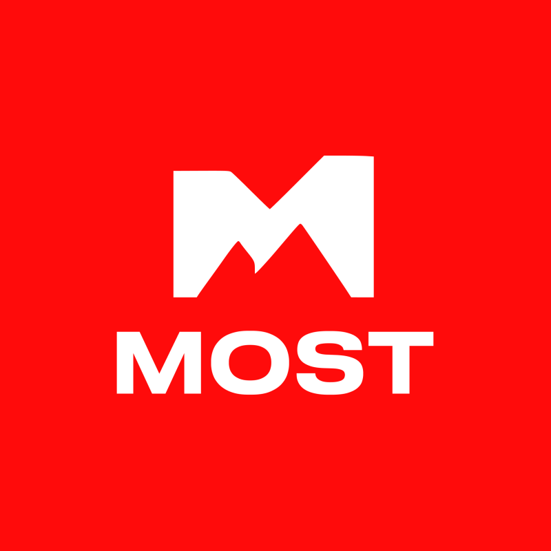 The image features the 'MOST' logo in white against a red background, with a stylized 'M' above the text.