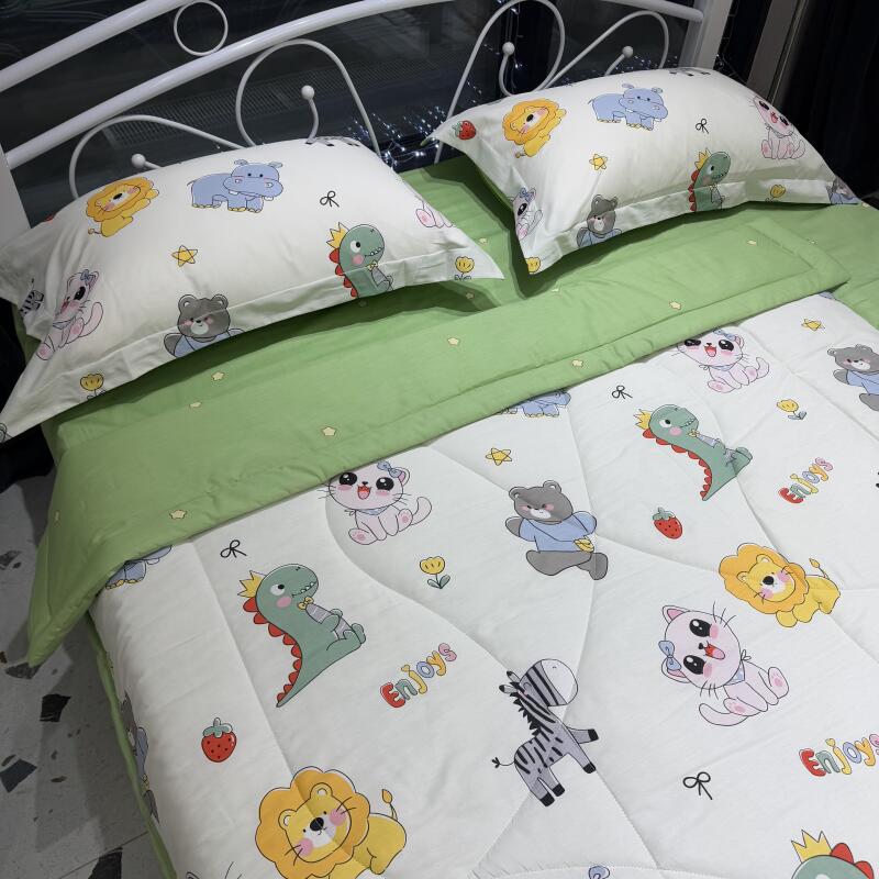 A bed with a white metal frame is covered with a green sheet and a white comforter and pillows, all decorated with cartoon animals.