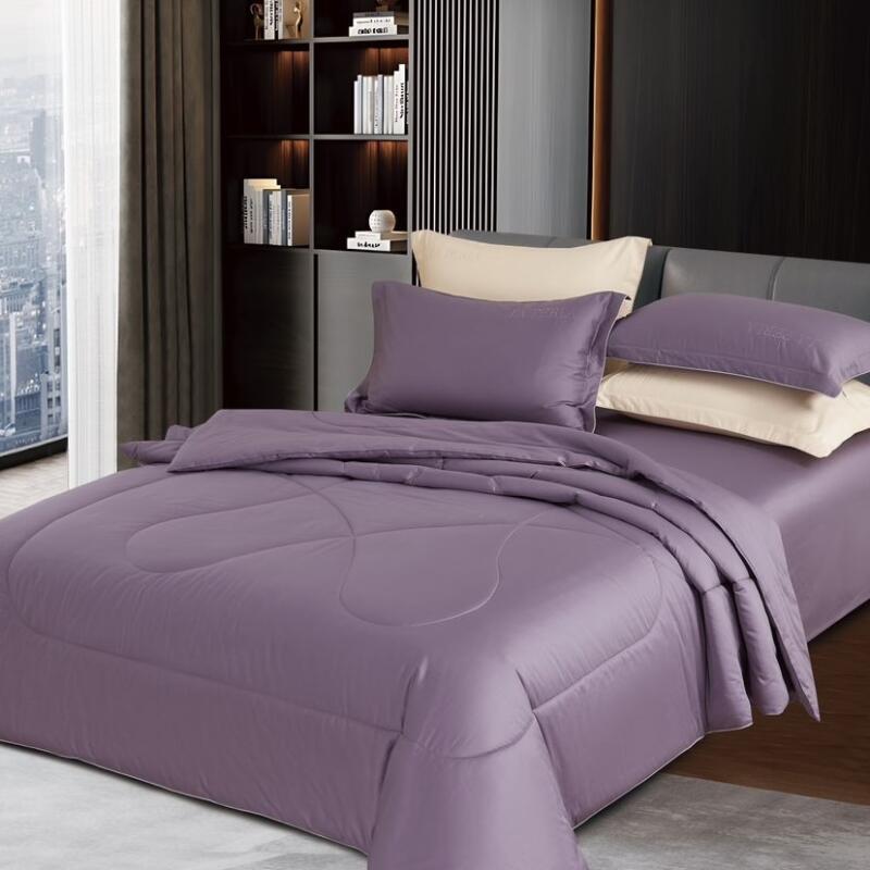 A bed with purple bedding is positioned in a room with a bookshelf and a window.