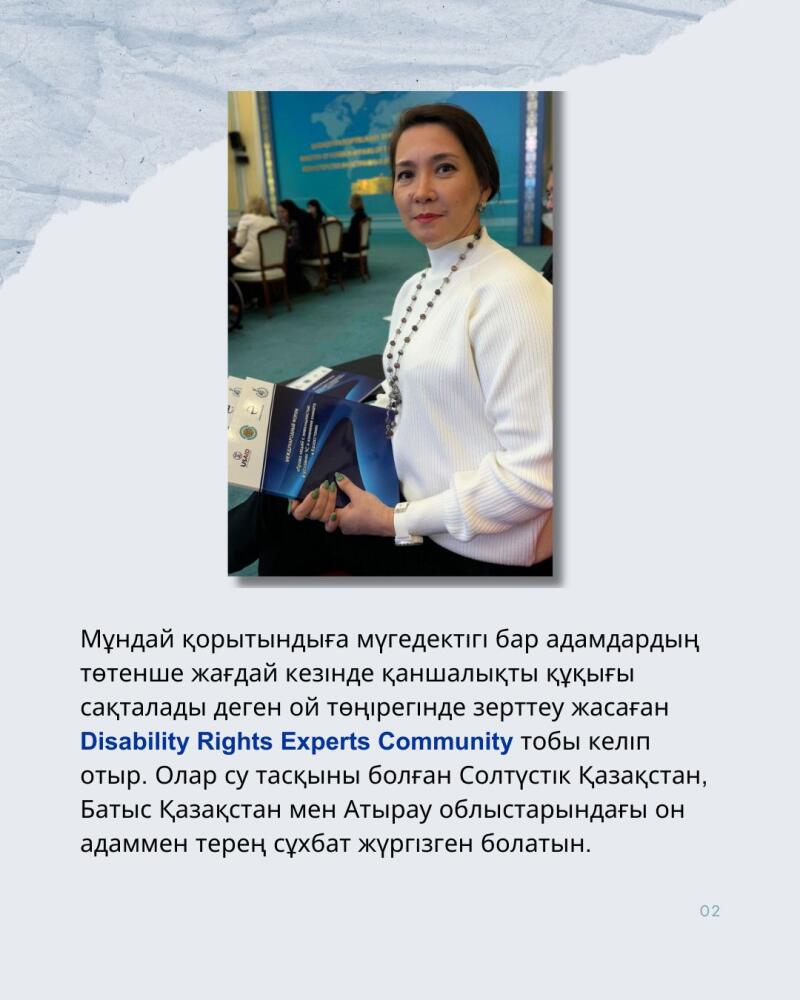 A woman in a white sweater and beaded necklace stands holding documents, with other people visible in the background; text below the image references "Disability Rights Experts Community."