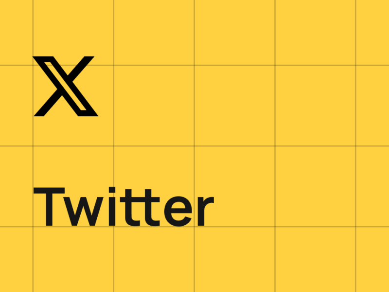 The image features a yellow background with a grid pattern, a black 'X' symbol in the upper-left corner, and the word 'Twitter' in black font below the 'X'.