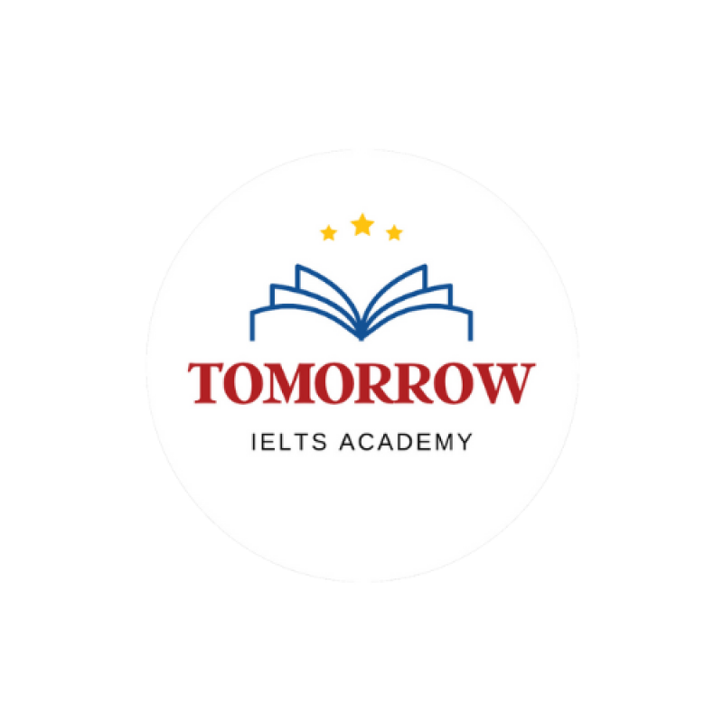 The logo features a blue outline of an open book with three yellow stars above it. Below the book is the word "TOMORROW" in red, and under that, the text "IELTS ACADEMY" in smaller letters.