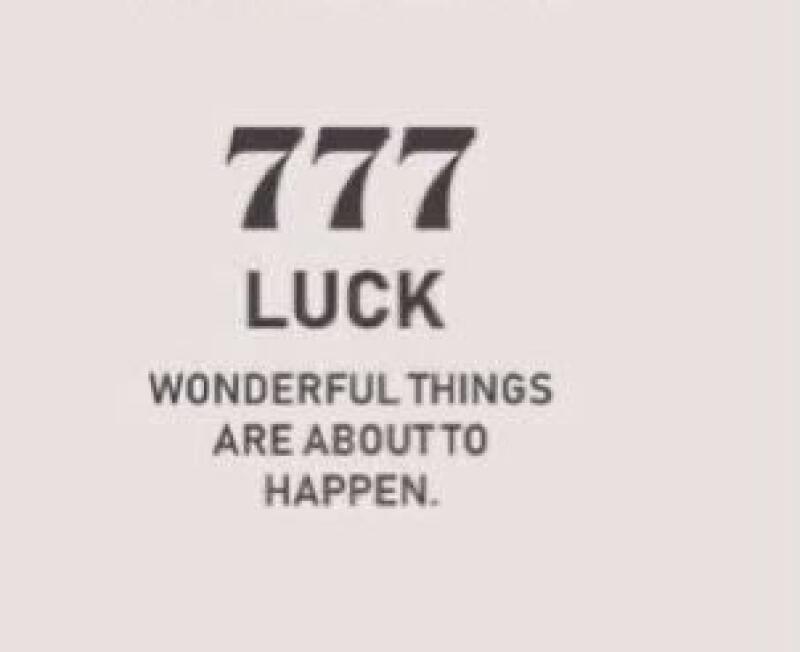 The image features the number "777" above the word "LUCK," followed by the phrase "WONDERFUL THINGS ARE ABOUT TO HAPPEN" in a simple, sans-serif font against a light background.