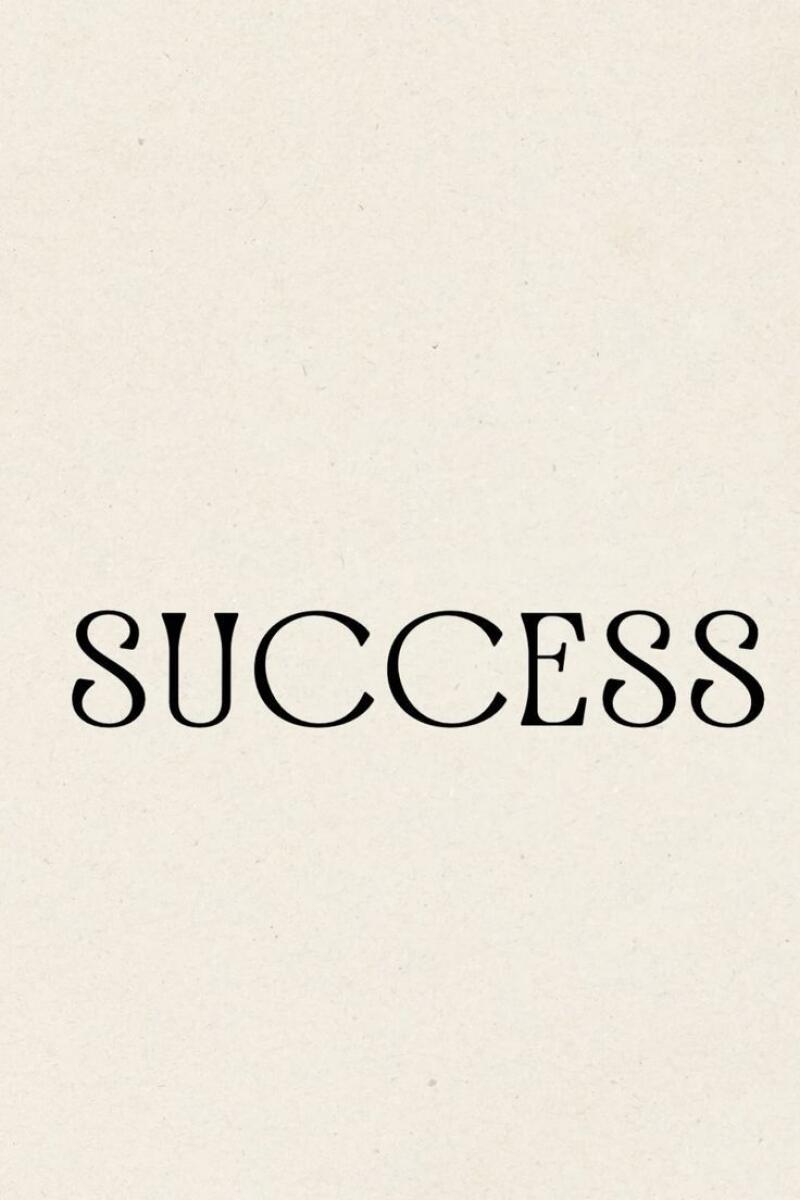 The image displays the word "SUCCESS" in a bold, classic font against a textured, off-white background.