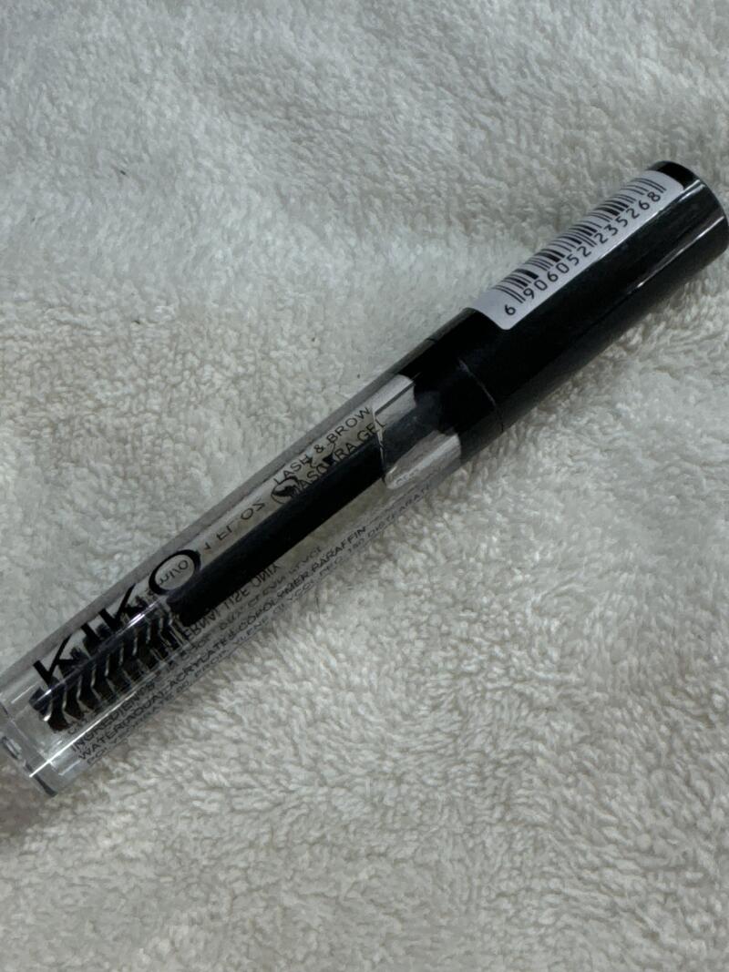 The image shows a clear tube of KIKO lash & brow mascara gel with a black cap, displaying a barcode and the product name.