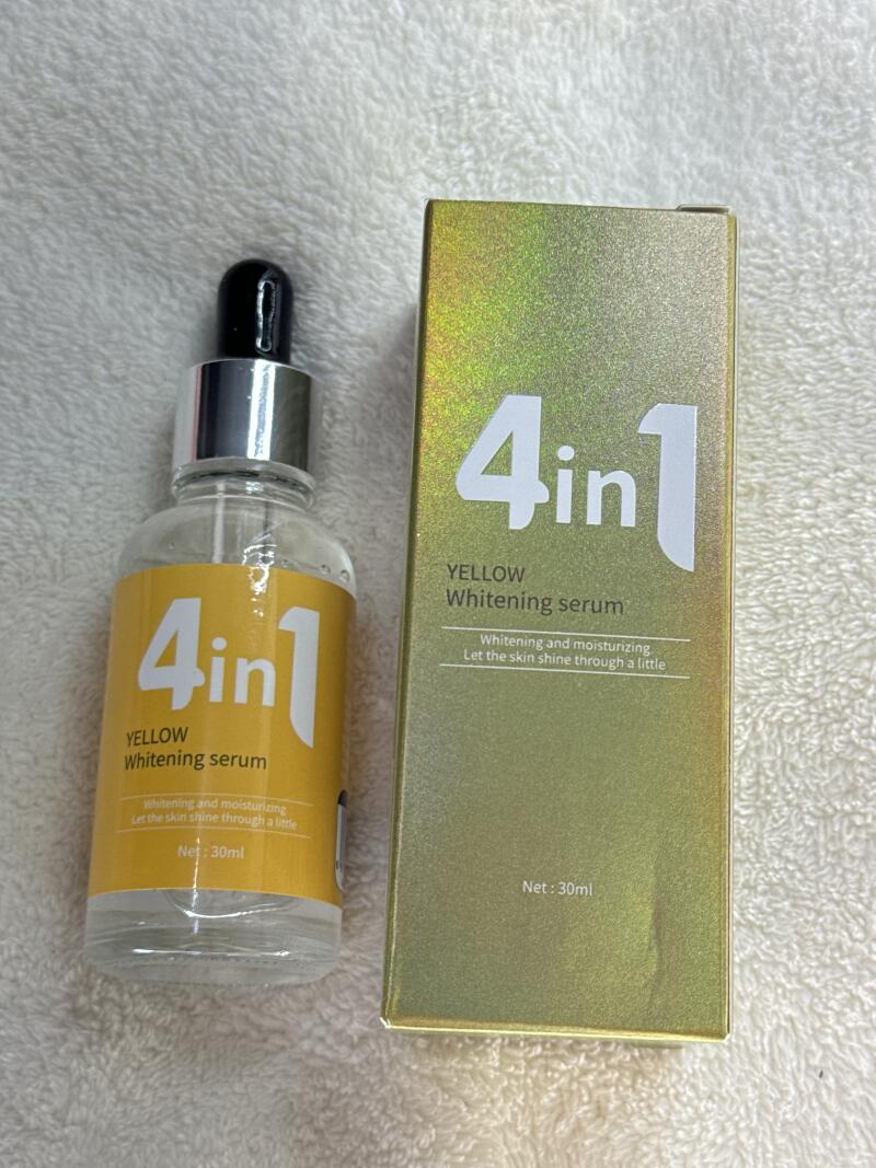 A bottle and a box of "4in1 YELLOW Whitening serum" are on the table.