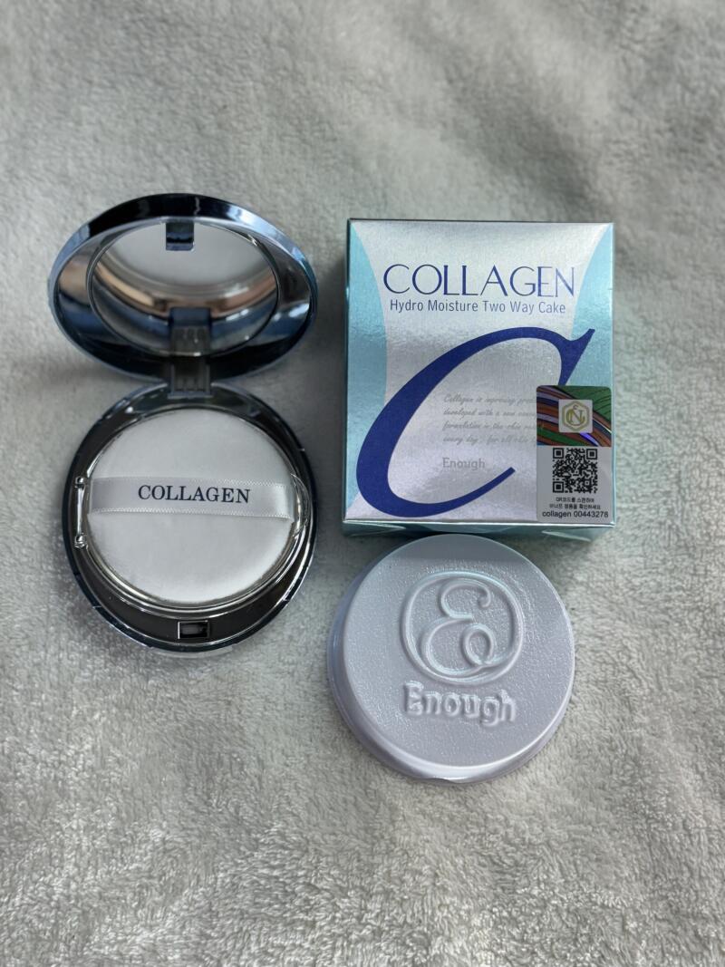 The image features an open compact of Collagen Hydro Moisture Two Way Cake with a mirror, a box of the same product, and a separate compact lid with the brand name 'Enough' embossed on it.