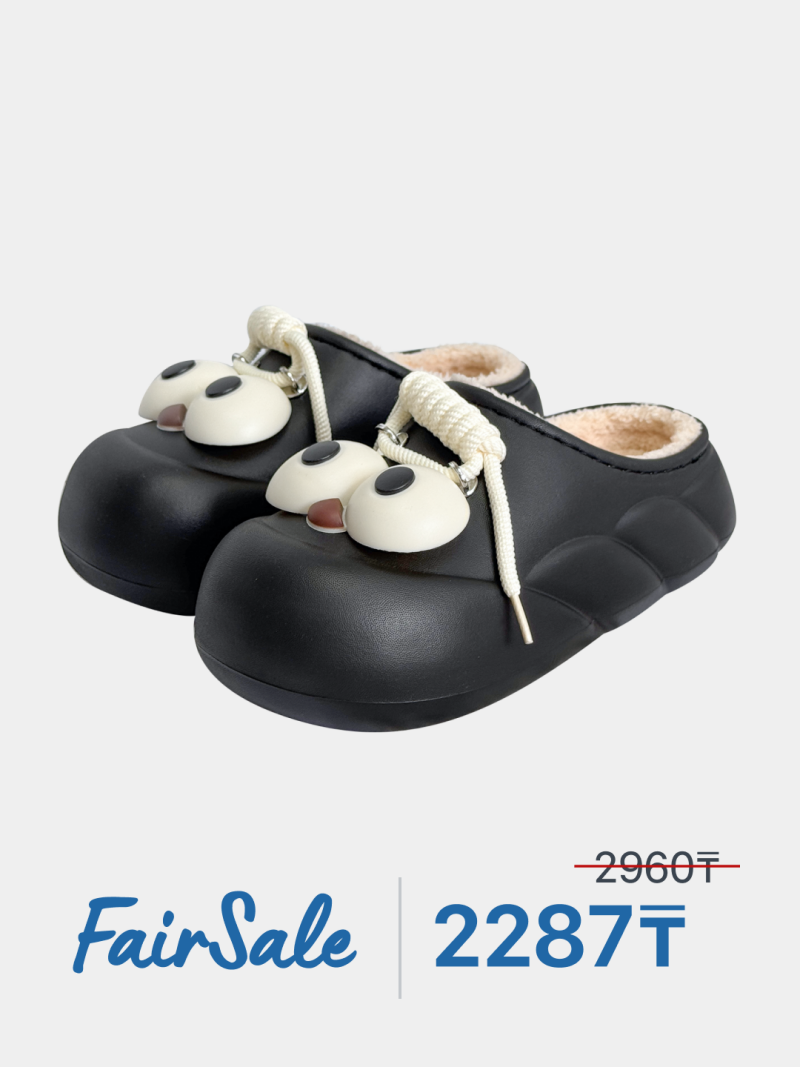The image features a pair of black clog-style shoes with cartoonish eye decorations and white laces, set against a plain white background. Text reading 'FairSale' and the price '2287〒' are visible at the bottom.
