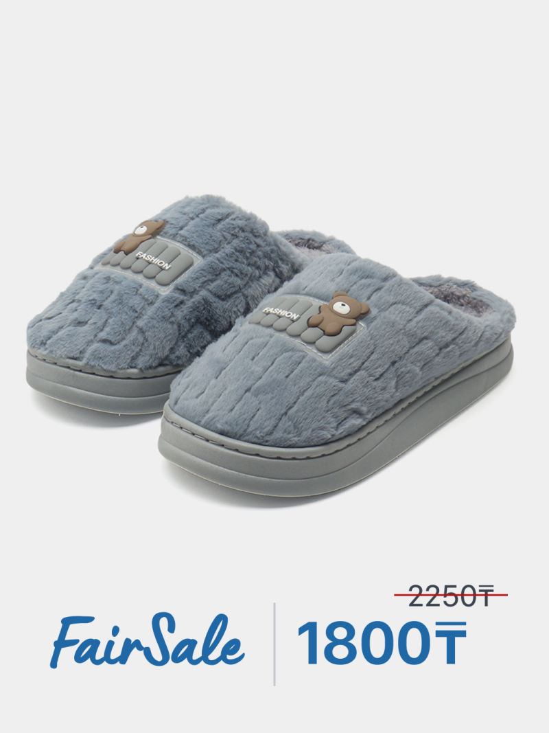 Two gray fuzzy slippers with a bear and the word "FASHION" are displayed with the text "FairSale" and "1800₸", the original price of "2250₸" is crossed out.