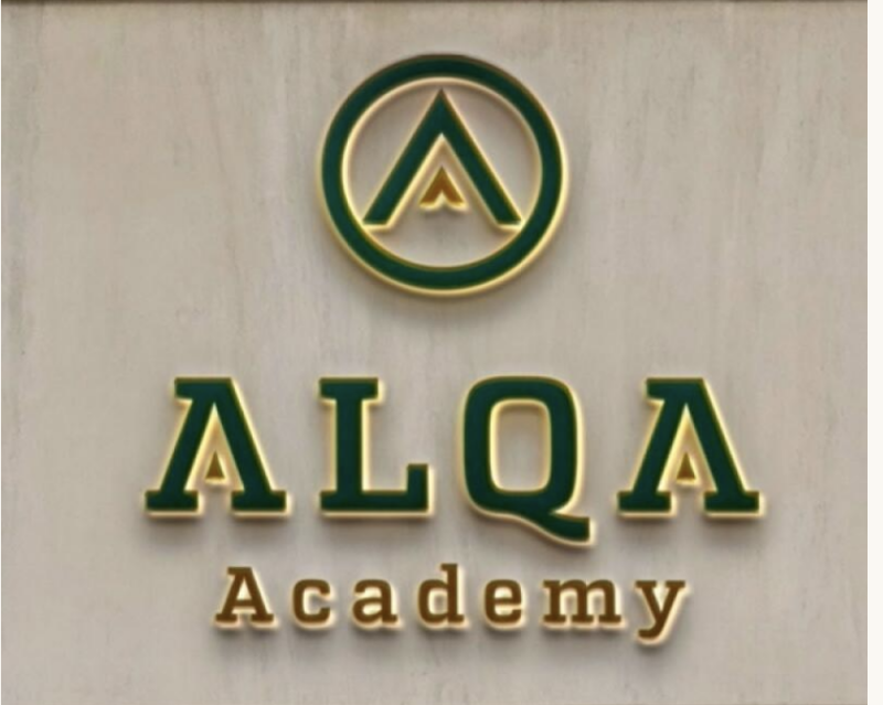 The image displays the logo for ALQA Academy, featuring a stylized 'A' within a circle above the text 'ALQA Academy' in gold and dark green.