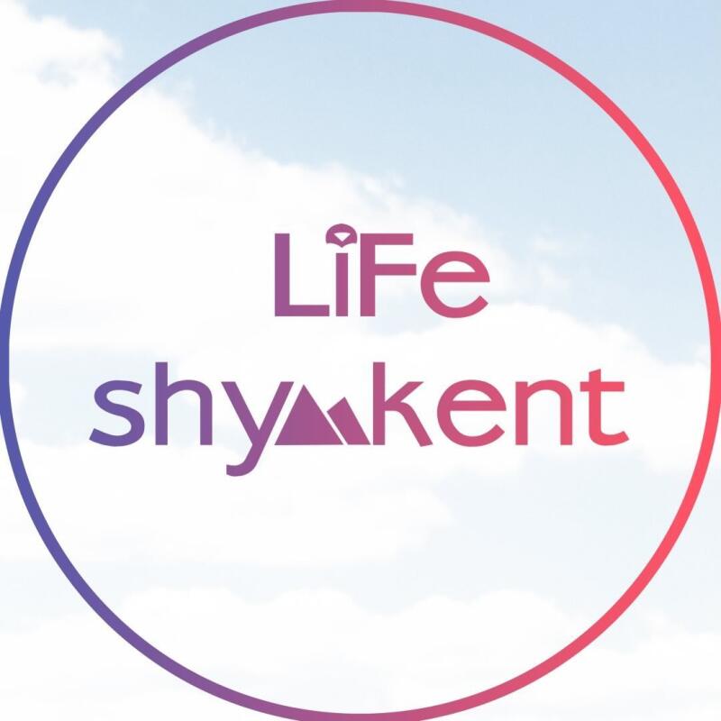 Logo with the text 'Life shyA-kent' inside a circle that fades from purple to red, against a background of blue sky with white clouds.