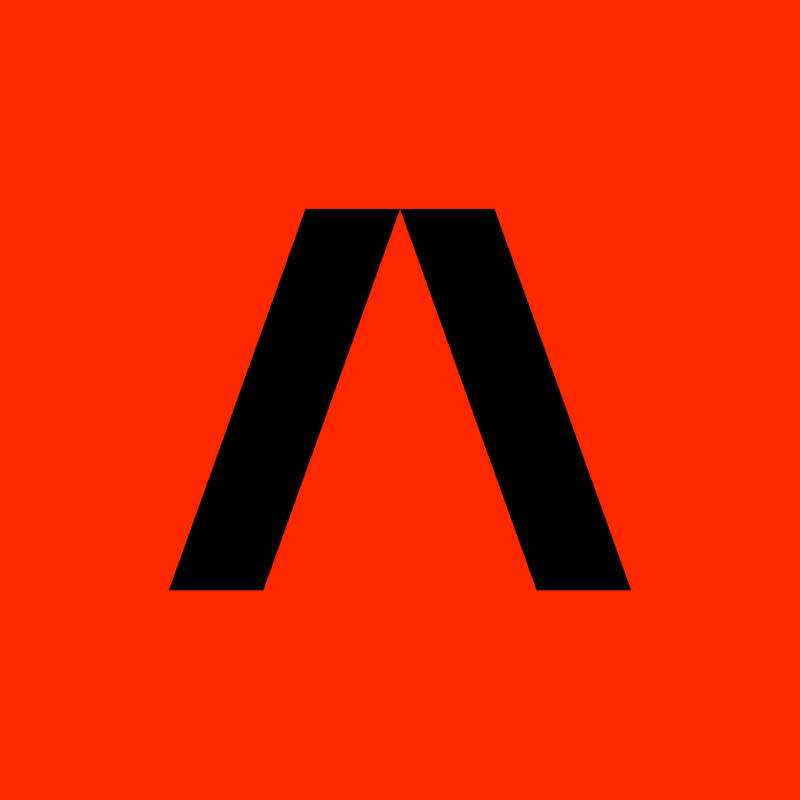 The image features a black, angular shape resembling an inverted 'V' or an 'A' without the crossbar, set against a vibrant orange background.