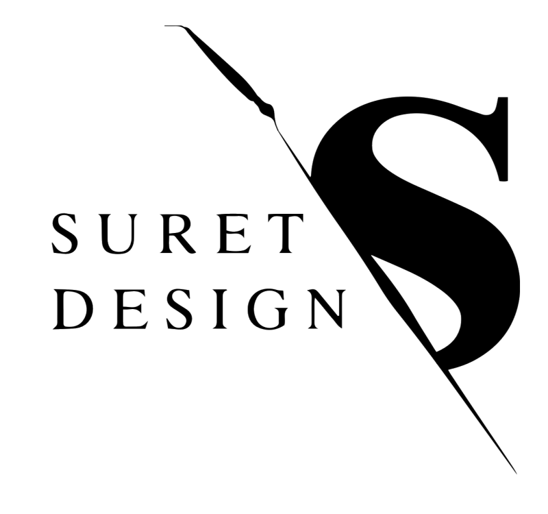 The image shows a logo with the text "SURET DESIGN" on the left and a stylized letter "S" intersected by a line with a paintbrush at the top on the right, all in white against a black background.