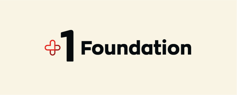 The logo for "1 Foundation" features a red plus sign next to a bold, black number one, followed by the word "Foundation" in black.