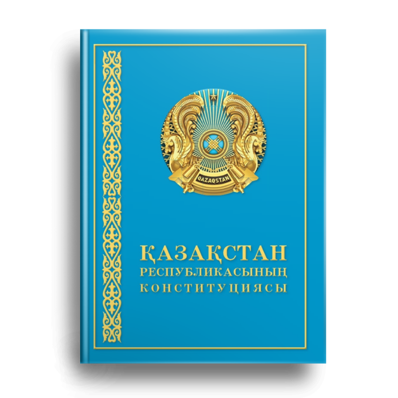 The image shows the cover of the Constitution of the Republic of Kazakhstan, which is light blue with a golden emblem and border. The text "QAZAQSTAN RESPÝBLIKASYNYŊ KONSTITÝCÍASY" is written on the cover.