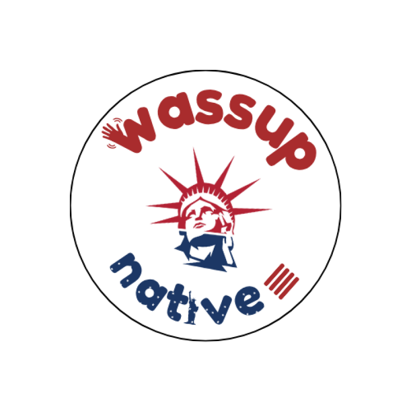 A round logo with the words "wassup native" in red and blue, respectively, and an image of the Statue of Liberty in the center.