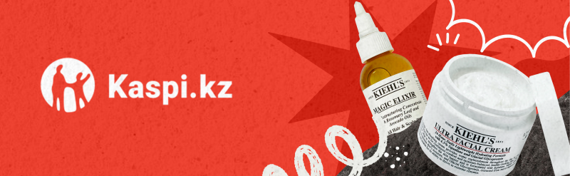 The image displays a Kaspi.kz banner alongside Kiehl's beauty products, including Magic Elixir and Ultra Facial Cream, set against a red background with white graphic elements.