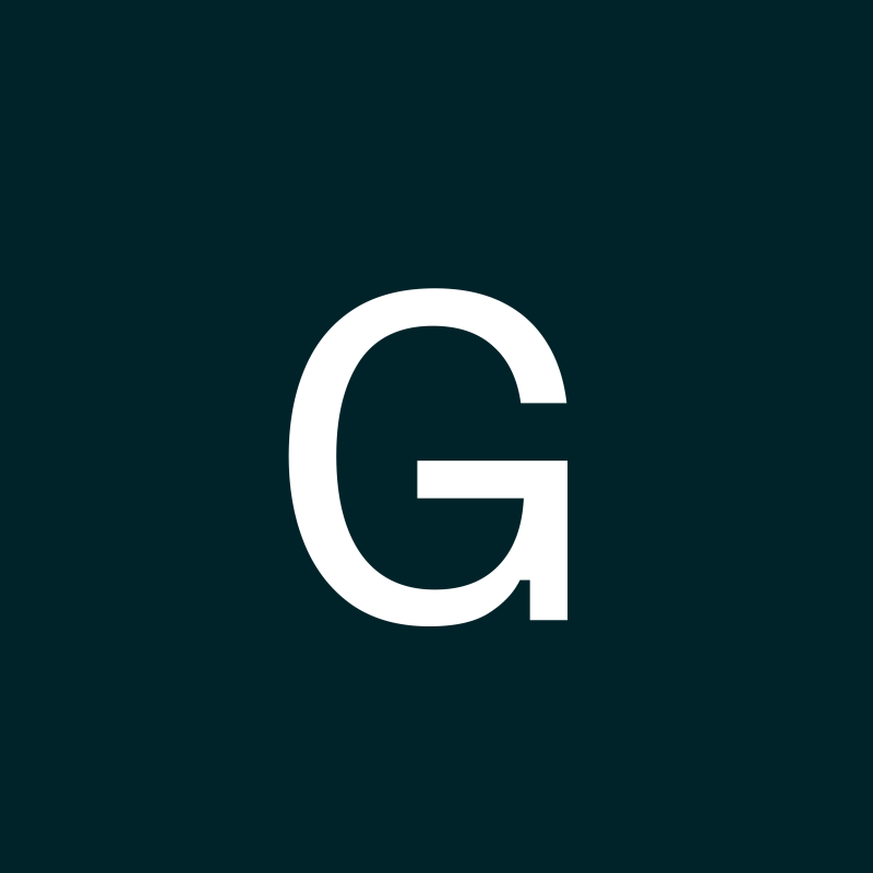 A large, white letter 'G' is set against a dark teal background.