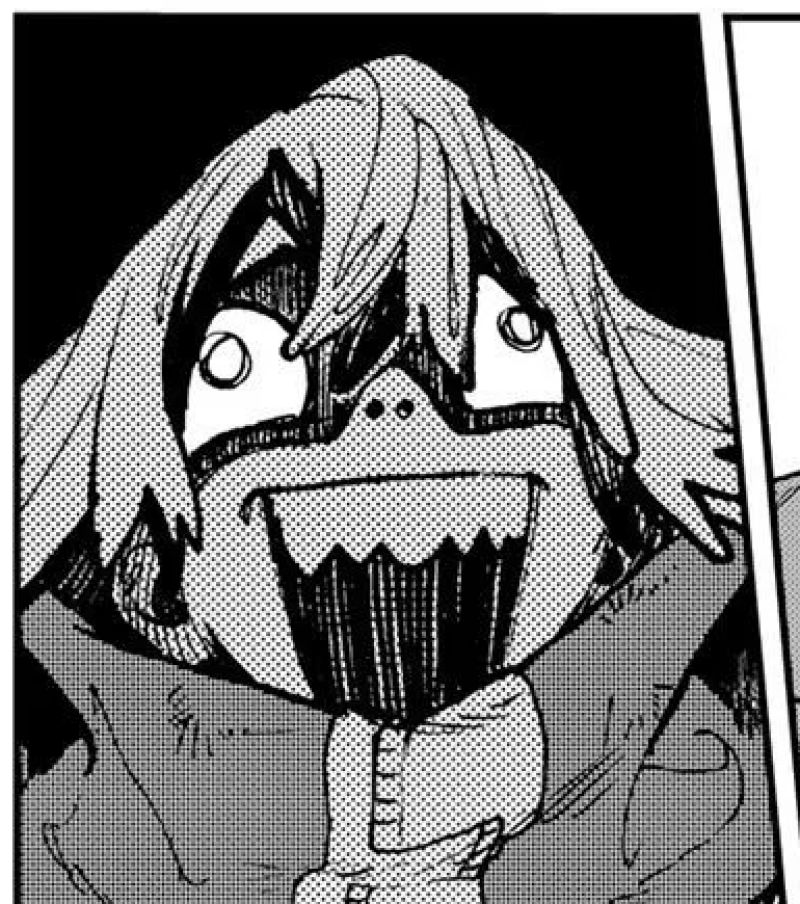 A grayscale manga panel shows a character with wide eyes and a large, toothy grin, wearing a collared jacket.