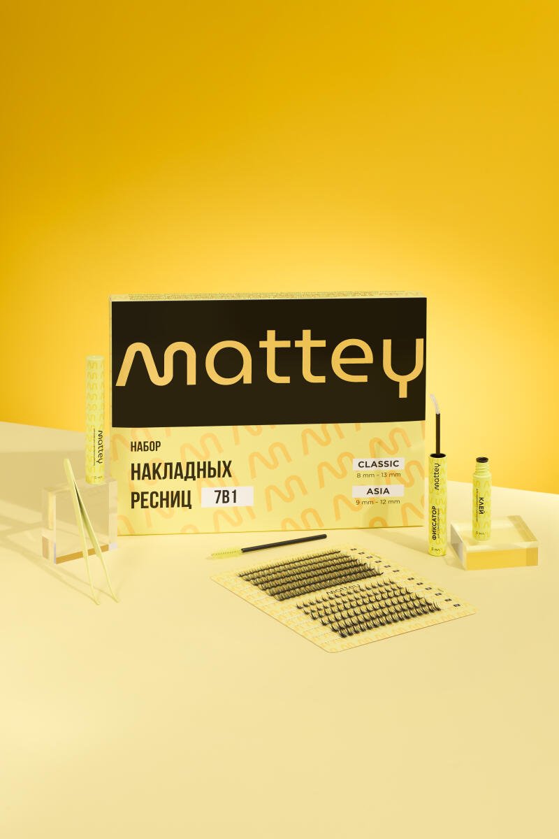 The image shows a Mattey false eyelashes set on a yellow surface, including tweezers, a tube of eyelash glue, and individual lashes on a tray. The set box indicates "CLASSIC 8 mm-13 mm" and "ASIA 9 mm-12 mm."