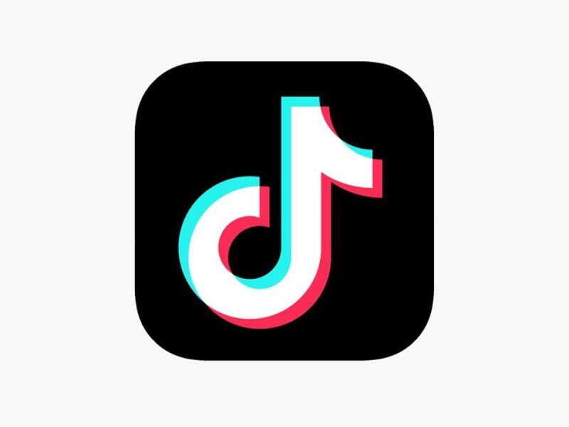 The image features the TikTok logo, which consists of a white musical note symbol with cyan and red offsets, set against a rounded black square.