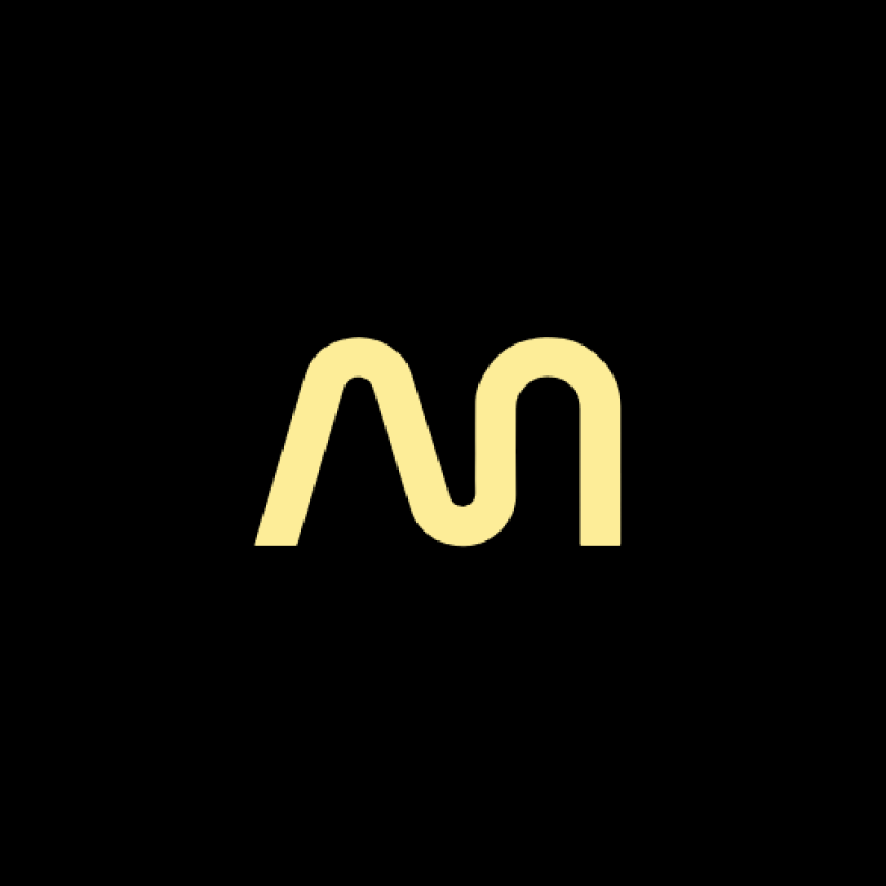 A stylized, light yellow 'M' shape is centered on a black background.