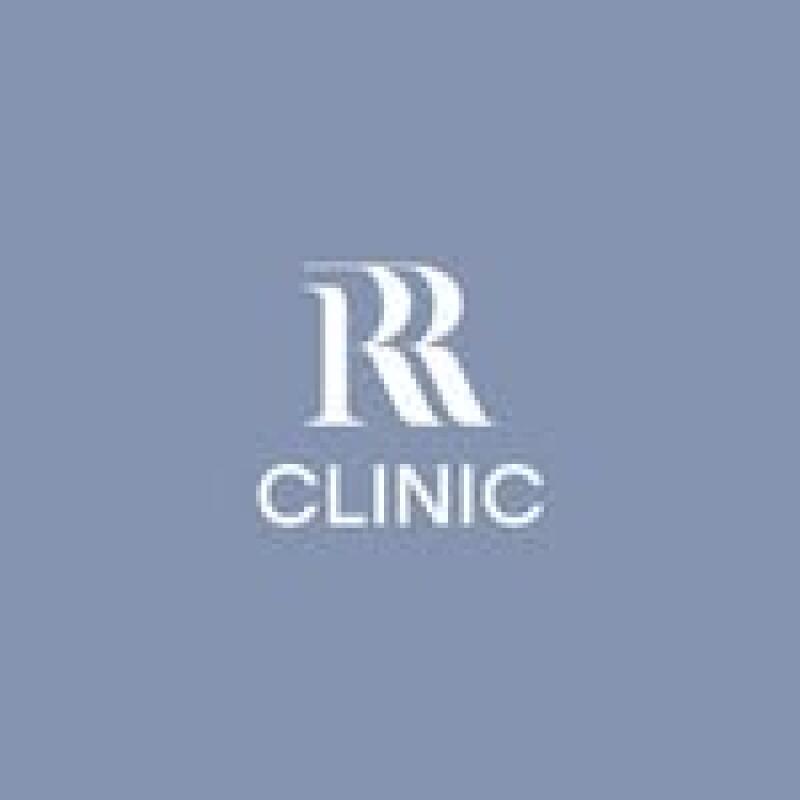 A blue background with a stylized white double 'R' above the word 'CLINIC' in white capital letters.