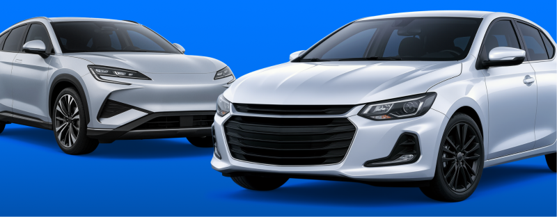 Two silver cars, an SUV and a sedan, are positioned on a blue background, with the sedan in the foreground and to the right.